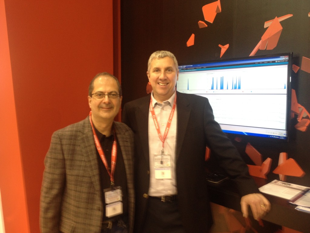 INETCO's Bijan Sanii and Jim McIntosh in the Vodafone booth at MWC2014 