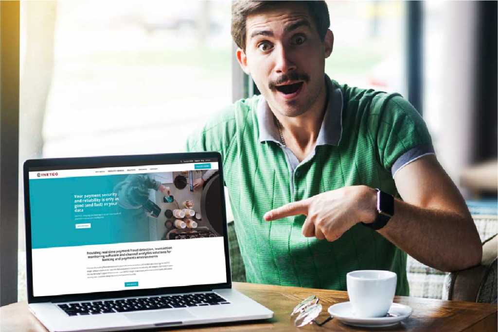 Man looking at new INETCO website